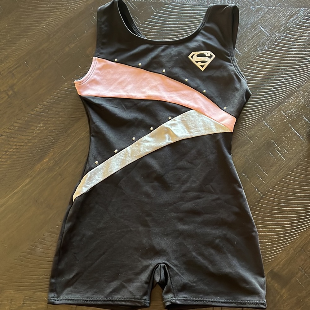 Supergirl by Nastia Liukin Child Leotard. XS (4-5). Black, pink and grey